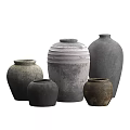 Handcrafted Ceramic Vessels In Various Sizes With Rustic Texture And Neutral Tones