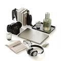 Modern Decorative Accessories Collection Featuring Camera Books Laptop Headphones And Tray