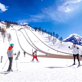 Outdoor Winter Fitness Activity With People Skiing On Snowy Mountain Slope