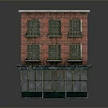 Red Brick Building With Multiple Floors And Ground Floor Glass Storefront Windows