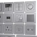 Assorted Electrical Switches And Sockets In White Black Beige With Functional Designs