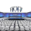 XCIND Modern Stage with Blue Lighting Illuminated Pillars and Audience Seats