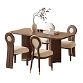 Modern Wooden Dining Table With Upholstered Chairs Decorative Vase And Books