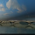 Concrete Bridge Over River With Street Lamps Pedestrian Walkway And Blue Sky White Clouds