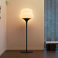 Modern Floor Lamp With White Cloud Shaped Lampshade Black Stand And Wooden Floor