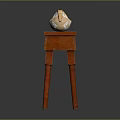 Red Wooden Table with Four Legs and Horse Shaped Decorative Ornament
