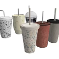 Assorted Disposable Drink Cups With Straws And Various Design Patterns