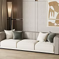 Modern Light Colored Three Seater Sofa With Throw Pillows Floor Lamp And Decorative Painting