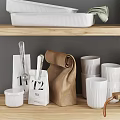 White Kitchenware Arranged On Wooden Shelves With Jars Bowls Plates And Spoons