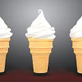 Three Golden Waffle Ice Cream Cones With Fluffy Whipped Cream Swirls