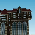 European style Architecture With Multi Story Structure Spires Arched Windows And Red Roof