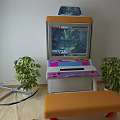 Cozy Recreational Area With Arcade Machine Glass Table Orange Bench And Green Plants