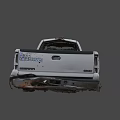 White Damaged Pickup Truck With Crushed Front End And Dented Body