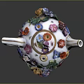 Decorative Porcelain Teapot With Colorful Flowers Vibrant Petals And Green Leaves