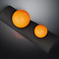 Two Orange Fitness Exercise Balls On Black Support Roller Sports Equipment
