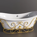 White Bathtub With Ornate Gold Iron Stand And Curved Decorative Details