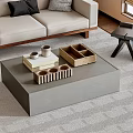Modern Gray Coffee Table With Books Cups Wooden Organizers And Sofa In Living Room