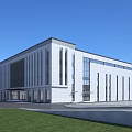 Modern White Stone Office Building With Large Windows Green Lawn And Clear Blue Sky