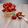 Fresh Red Apples in Bowl with Sliced Pieces and Knife on Wooden Table