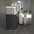Vintage Yashica Digital Camera With Silver Body And Xenar Lens Design