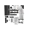 Organized Bathroom Essentials With Storage Shelves Towels Robe Bottles And Toiletries