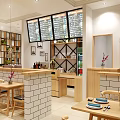 Warm Modern Restaurant Interior With Wooden Elements Green Plant Wall Brick Walls Tables And Chairs