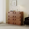 Brown Wooden Chest of Drawers With Round Knobs And Table Lamp In Living Room Corner