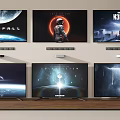 Multiple Televisions Displaying Various Scenes Wall Mounted and Stand Placed
