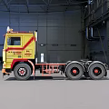 Yellow Volvo Truck With Northstar Writing Parked In Industrial Indoor Space