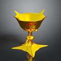 Golden Decorative Cup With Star Shaped Base Red Accents And Petal Like Rim