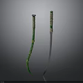 Two Decorative Weapons With Green Yellow Handles And Silver Blades