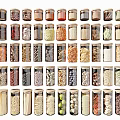 Glass Spice Jars with Various Spices Grains and Beans for Organized Kitchen Pantry
