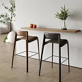 Modern Bar Counter With Wooden Top Two Bar Stools Oranges And Decorative Vase Plants