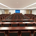 Large Conference Room Interior Layout With Arranged Wooden Seats And Front Screen