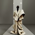 Woman Wearing Sunglasses In Beige Oversized Coat With Dramatic Structural Design On Minimalist Runway