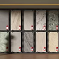 Various Design Floor Tiles Displayed On Wall In Showroom With Sculpture