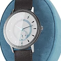 Elegant Minimalist Watch With White Dial Black Leather Strap And Silver Bezel On Blue Cushion