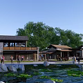 Traditional Boutique Guesthouse Building With Pond Lotus Leaves Stone Decorations And Green Trees