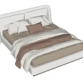 Double Bed with White Headboard Beige Sheets Brown Pillow and Blanket