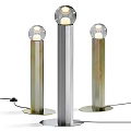 Modern Floor Lamps With Cylindrical Metallic Bodies And Spherical Glowing Shades