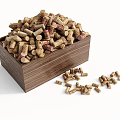 Wooden Box Filled With Wine Corks And Scattered Cork Pieces On White Background