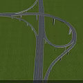Modern Highway Bridge Interchange With Curved Lanes And Green Grass Surroundings