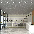 Bright Retail Interior Design With White Counter Shelves Recessed Lights And Tables Chairs