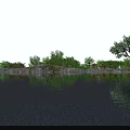 Peaceful Lakeside Natural Scenery With Clear Reflective Water Lush Green Trees Under Bright Blue Sky