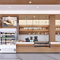 Bright Modern Dessert Shop Interior With Pastry Displays And Large Windows