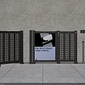 Grey Turnstiles Featuring Central Advertising Screen With Fly First Class Ad And Control Panel
