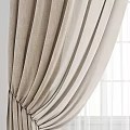 Beige Velvet Curtains with Sheer Inner Layer Draped Over White Window Pane