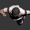 Boy Wearing White T Shirt With Red Black Design Black Shorts Gesturing On Gray Background