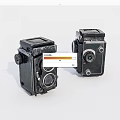 Two Vintage Twin Lens Reflex Cameras Black Classic Digital Camera Bodies On White Background