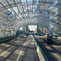 Modern Arch Shaped Road Infrastructure With Transparent Roof Metal Framework And Vehicles